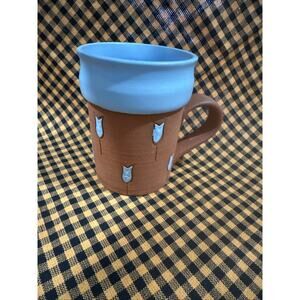 Terracotta coffee mug with blue tulips -blue glaze interior and outside rim